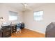 Bright bedroom with hardwood floors and ceiling fan at 105 Park Cir, Daytona Beach, FL 32117