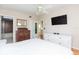 Main bedroom with large TV, walk-in closet and ensuite bathroom at 105 Park Cir, Daytona Beach, FL 32117