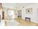 Casual dining area with view into kitchen and access to backyard at 105 Park Cir, Daytona Beach, FL 32117