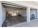 Two-car garage with extra storage and workshop area at 105 Park Cir, Daytona Beach, FL 32117