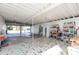 Bright Garage with extra storage and shelving at 105 Park Cir, Daytona Beach, FL 32117