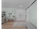 Bright entryway with light wood floors and a bench at 21 Tipperary Ln, Ormond Beach, FL 32176