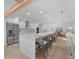 Modern kitchen with white cabinets and a large island at 21 Tipperary Ln, Ormond Beach, FL 32176