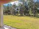 Expansive backyard showcasing lush greenery, mature trees, and a serene atmosphere at 3142 Silvermines Ave, Ormond Beach, FL 32174