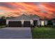 Charming one-story home with a three car garage and beautiful stone accents at 3142 Silvermines Ave, Ormond Beach, FL 32174