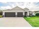 Charming one-story home with a three car garage and beautiful stone accents at 3142 Silvermines Ave, Ormond Beach, FL 32174