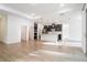 Open floor plan featuring kitchen with stainless steel appliances and lots of natural light at 3142 Silvermines Ave, Ormond Beach, FL 32174