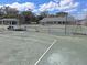 Well-maintained tennis courts with viewing gazebo and chain link fence, ideal for recreational play at 3142 Silvermines Ave, Ormond Beach, FL 32174