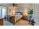 Relaxing main bedroom with a comfy bed and ocean theme decor at 3370 Ocean Shore Blvd # 3060, Ormond Beach, FL 32176