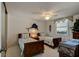Guest bedroom with twin beds and coastal decor at 3370 Ocean Shore Blvd # 3060, Ormond Beach, FL 32176