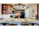 Well-equipped kitchen with granite countertops and wooden cabinets at 3370 Ocean Shore Blvd # 3060, Ormond Beach, FL 32176