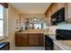 Spacious kitchen with granite countertops and stainless steel appliances at 3370 Ocean Shore Blvd # 3060, Ormond Beach, FL 32176