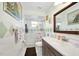 Clean bathroom with shower, vanity, and decorative tile at 41 Laurel Oaks Cir, Ormond Beach, FL 32174