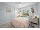 Charming bedroom with light walls and a comfortable bed at 41 Laurel Oaks Cir, Ormond Beach, FL 32174