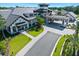 Attractive exterior view of the clubhouse featuring a covered entrance and well-manicured landscaping at 820 Aldenham Ln, Ormond Beach, FL 32174
