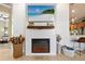 Modern fireplace with shiplap accent wall and mounted television in the living room at 820 Aldenham Ln, Ormond Beach, FL 32174