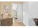 Bright main bedroom offers great natural light and serene view from the open doorway at 820 Aldenham Ln, Ormond Beach, FL 32174