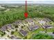 Aerial view of the property's location within the community and surrounding landscape at 830 Aldenham Ln, Ormond Beach, FL 32174