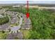 Aerial view of the property's location within the community and surrounding landscape at 830 Aldenham Ln, Ormond Beach, FL 32174
