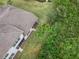Aerial view highlighting the home's backyard and natural surroundings at 830 Aldenham Ln, Ormond Beach, FL 32174