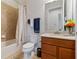 Neat bathroom with a toilet, shower, and vanity at 830 Aldenham Ln, Ormond Beach, FL 32174