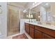 Large bathroom with double sinks, shower, and a toilet at 830 Aldenham Ln, Ormond Beach, FL 32174
