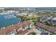 Aerial view of condo community near waterfront with parking at 135 Lagoon Ct, New Smyrna Beach, FL 32169