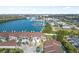 Aerial view of condo community by the water, featuring boat slips at 135 Lagoon Ct, New Smyrna Beach, FL 32169