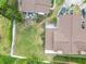 Overhead view of home and surrounding landscape at 135 Lagoon Ct, New Smyrna Beach, FL 32169