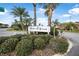 Venetian Villas community entrance sign with landscaping at 135 Lagoon Ct, New Smyrna Beach, FL 32169