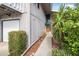 Front entry with walkway and landscaping at 135 Lagoon Ct, New Smyrna Beach, FL 32169