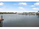 Scenic view of calm water, boats, and marina at 135 Lagoon Ct, New Smyrna Beach, FL 32169