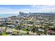 A high-angle view showcases homes in a residential area near a coastal city and sandy shoreline at 188 Benjamin Dr, Ormond Beach, FL 32176