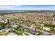 An aerial view shows the property in a residential neighborhood with tree lined streets at 188 Benjamin Dr, Ormond Beach, FL 32176