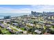 Stunning aerial view of the neighborhood with ocean views and the city skyline in the background on a sunny day at 188 Benjamin Dr, Ormond Beach, FL 32176