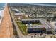 Condo aerial showing the beach location, courtyard and pool at 2100 Ocean Shore Blvd # 1150, Ormond Beach, FL 32176