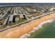 Beachfront condo aerial showcasing proximity to the ocean and pool at 2100 Ocean Shore Blvd # 1150, Ormond Beach, FL 32176