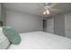 Bedroom with hardwood floors, ceiling fan and a queen-size bed at 2596 Tulane Ave # 4, Daytona Beach, FL 32118