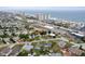 The aerial image shows a house near the beach, providing views of the ocean and the convenience of coastal living at 5 Alamanda Dr, Ormond Beach, FL 32176