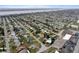 An aerial neighborhood shot highlights the home's central location among residential streets at 5 Alamanda Dr, Ormond Beach, FL 32176