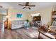 Inviting living room featuring a neutral sofa and a decorative glass coffee table at 5 Alamanda Dr, Ormond Beach, FL 32176