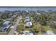 Aerial view of house near the water with a large lot at 55 Neptune Ave, Ormond Beach, FL 32176