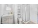 Clean bathroom with a shower, toilet and vanity at 55 Neptune Ave, Ormond Beach, FL 32176