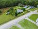 The property has a large yard, outbuilding, RV and nice landscaping at 6680 Se 174Th Ln, Summerfield, FL 34491