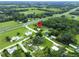 An aerial view of the property showing proximity to the road and surrounding neighborhood at 6680 Se 174Th Ln, Summerfield, FL 34491