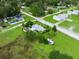 Aerial view of property showing RV, out building and lush surroundings at 6680 Se 174Th Ln, Summerfield, FL 34491