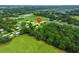 An aerial view of the area surrounding the house and marked property lines at 6680 Se 174Th Ln, Summerfield, FL 34491