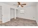 Bedroom with wood-look floors, two closets and natural light at 6680 Se 174Th Ln, Summerfield, FL 34491