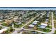 Aerial view of a residential area with established homes, mature trees, and easy access to the waterfront at 100 Lynnhurst Dr, Ormond Beach, FL 32176