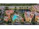 Beautiful aerial view of resort amenities including a pool, pond and clubhouse at 12544 Floridays Resort Dr # 507-B, Orlando, FL 32821